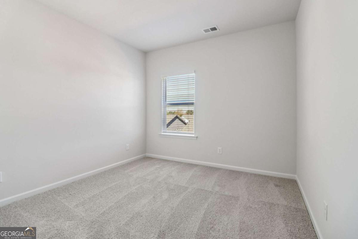 708 Shetland Trail Cartersville, GA 30121 - Photo 44 of 54 a view of an empty room and window