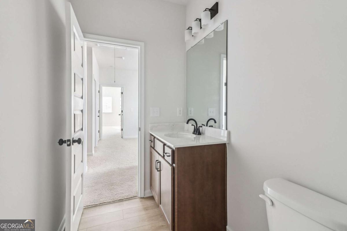 708 Shetland Trail Cartersville, GA 30121 - Photo 45 of 56 a bathroom with a sink toilet and shower