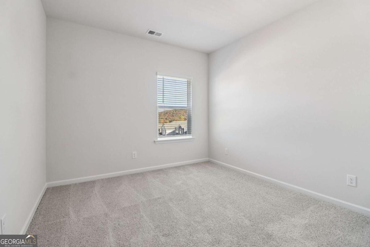 708 Shetland Trail Cartersville, GA 30121 - Photo 48 of 54 an empty room with a window