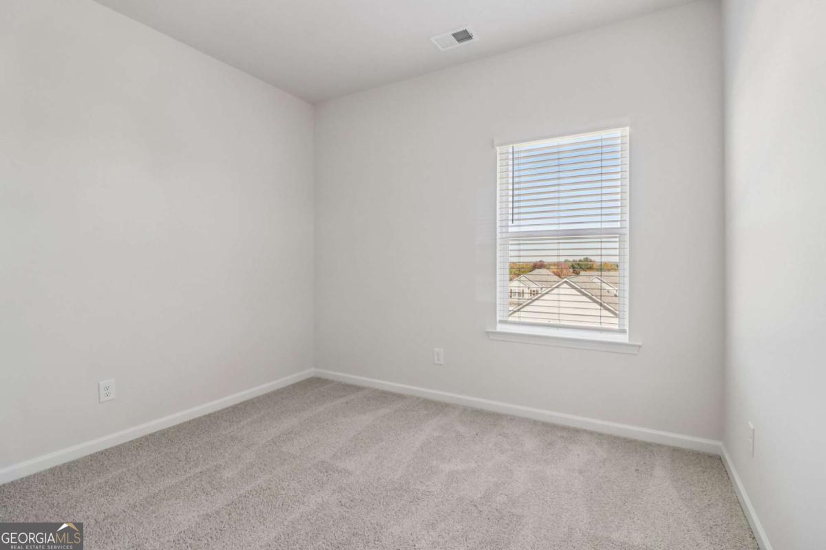 708 Shetland Trail Cartersville, GA 30121 - Photo 51 of 56 an empty room with a window