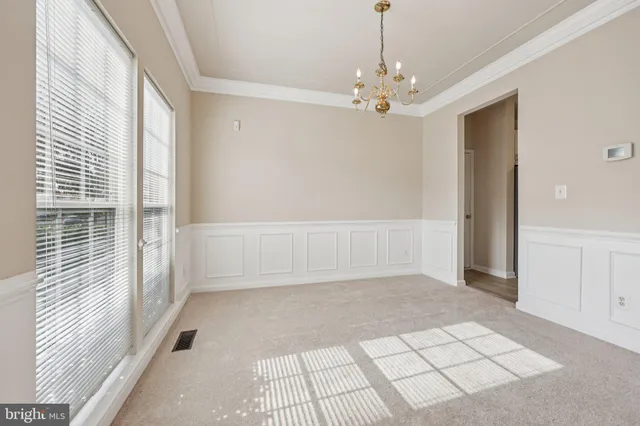 a view of a hallway with windows