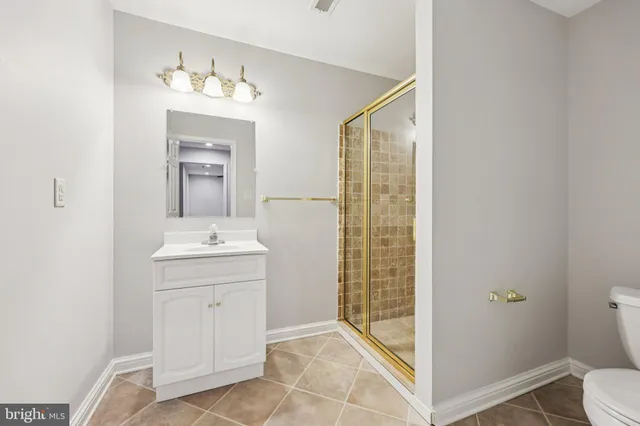 an aerial view of residential building with parking space