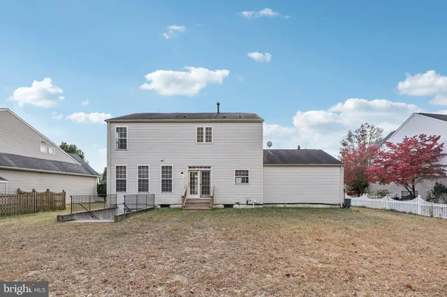 a front view of a house with yard