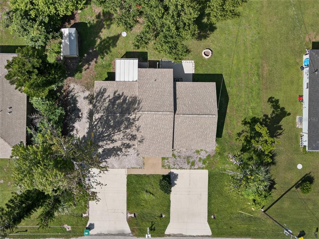 12337 Buffing Road, Unit A AND B Port Charlotte, FL 33981 - Photo 22 of 27 an aerial view of a house with a yard