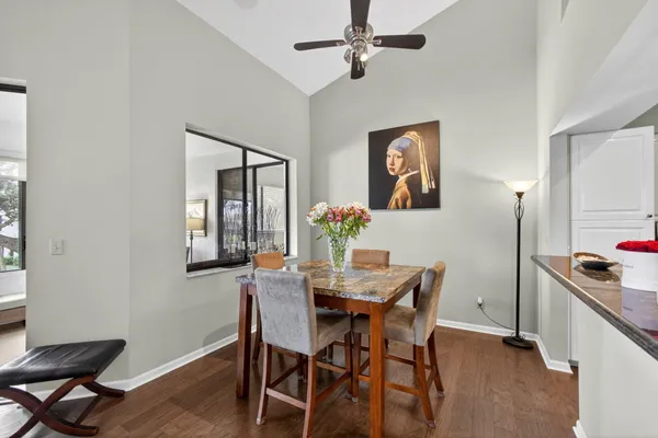 a kitchen with counter top space cabinets and stainless steel appliances