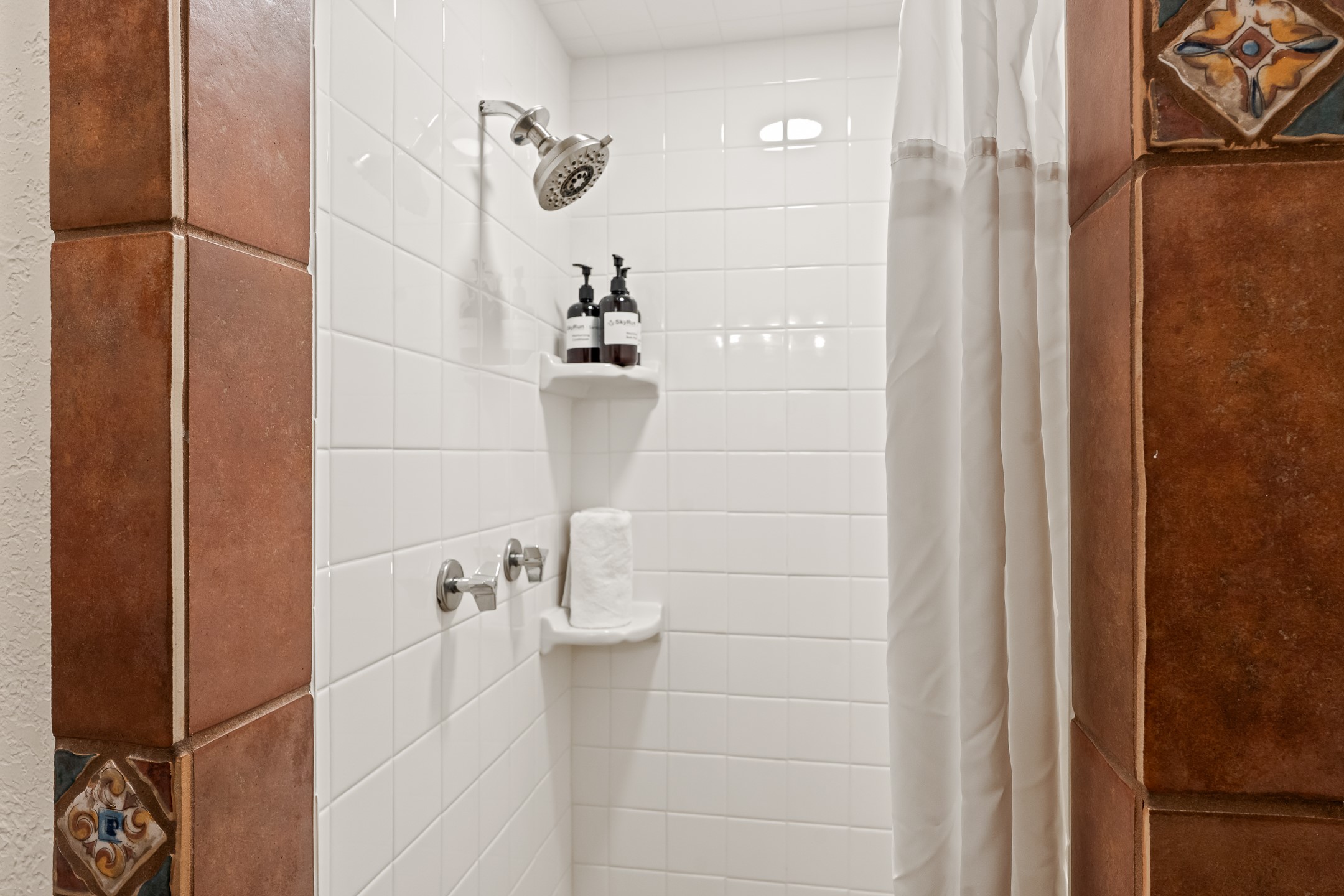 320 Artist Road, Unit 93 Santa Fe, NM 87501 - Photo 23 of 40 Step-in shower in guest bathroom