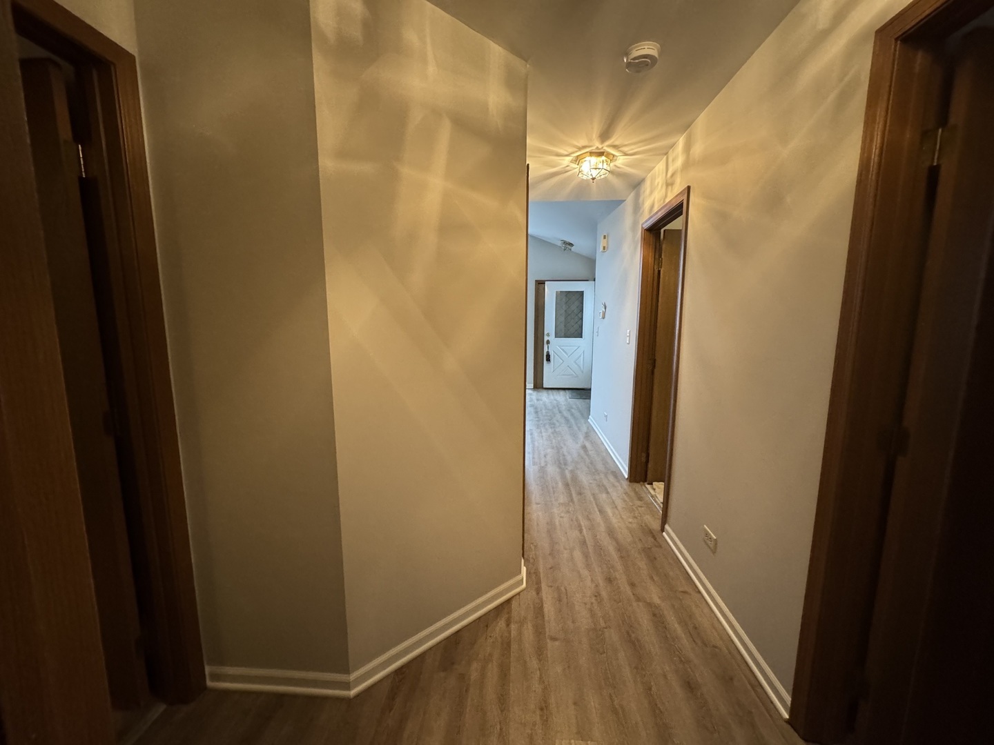 429 Prairieview Drive Oswego, IL 60543 - Photo 15 of 21 a hallway with wooden floor