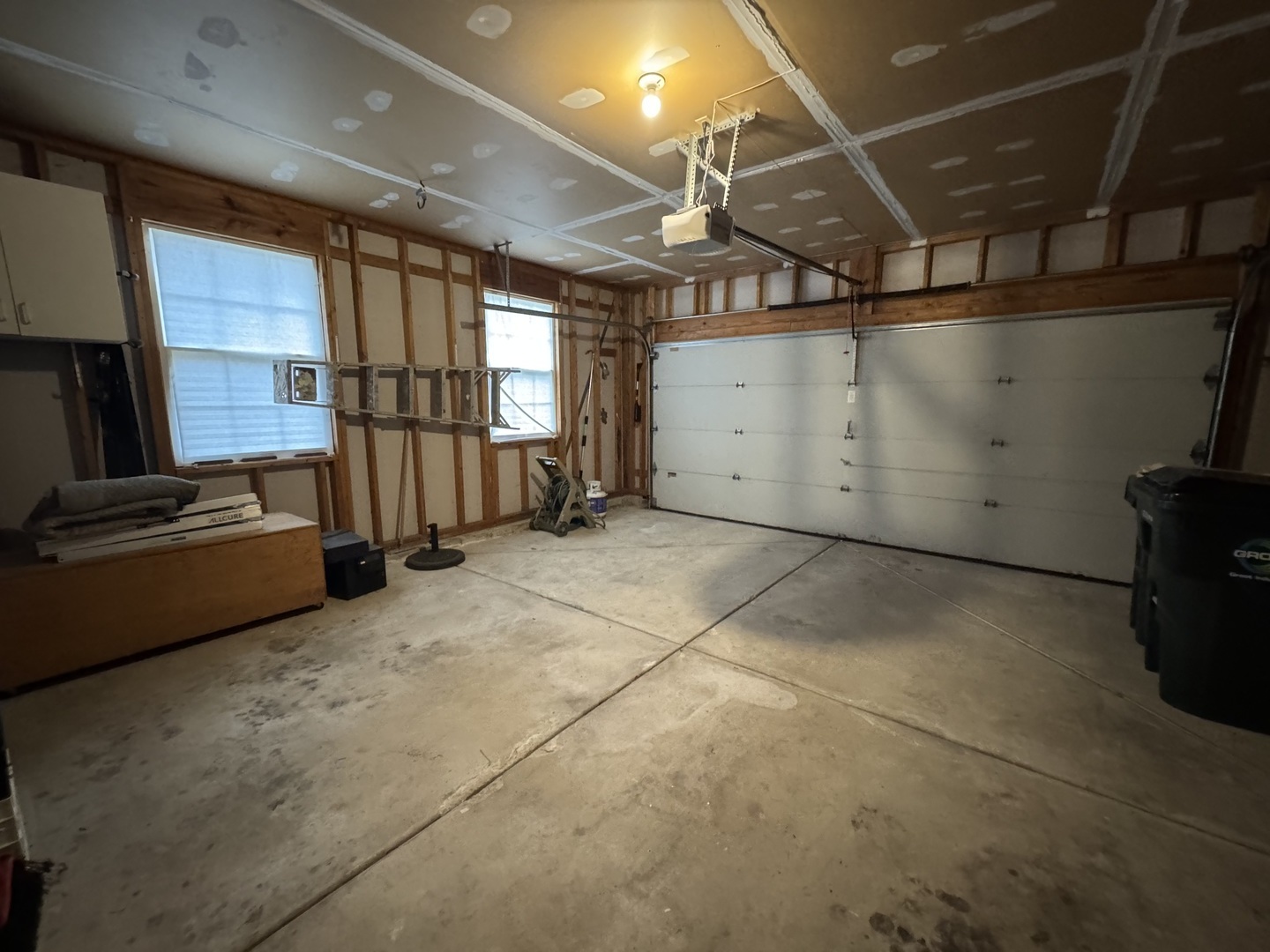 429 Prairieview Drive Oswego, IL 60543 - Photo 19 of 21 a view of a garage with wooden floor