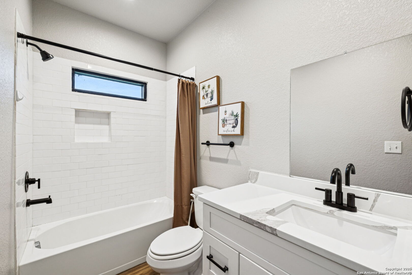 177 East Short Meadow Drive Lytle, TX 78052 - Photo 34 of 63 a bathroom with a granite countertop sink toilet and shower