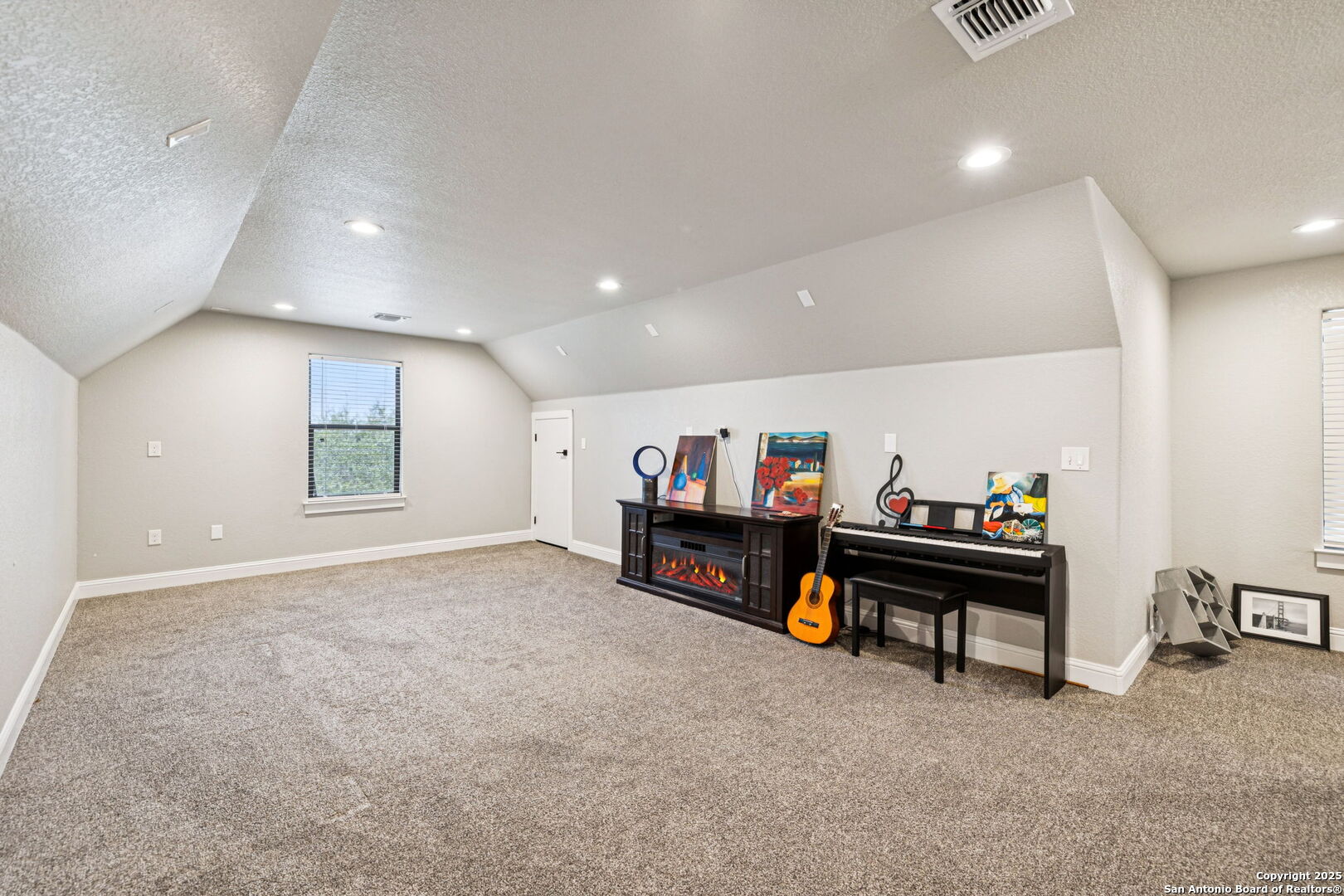 177 East Short Meadow Drive Lytle, TX 78052 - Photo 45 of 63 a living room with furniture and a ceiling fan