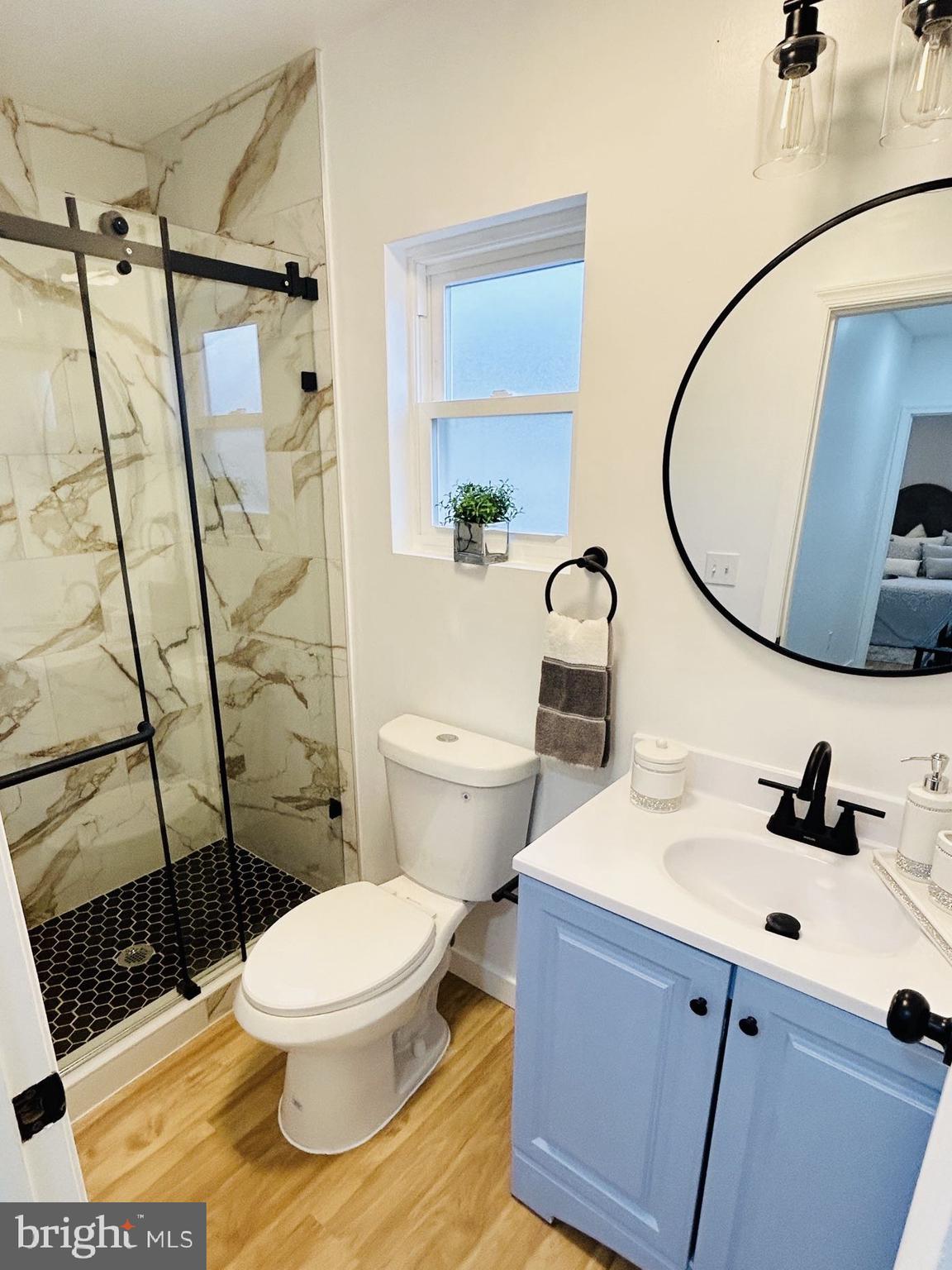 2013 South Bouvier Street Philadelphia, PA 19145 - Photo 11 of 18 a bathroom with a sink toilet and shower