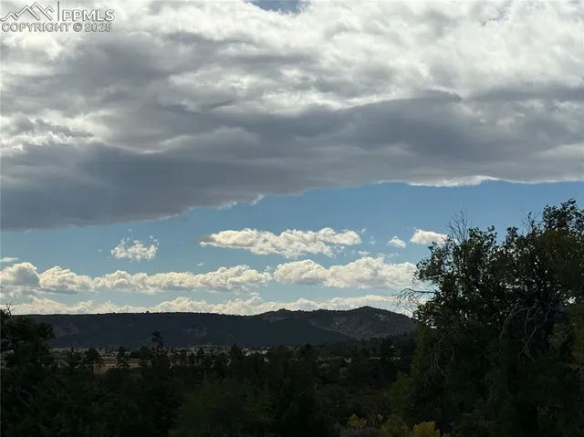 a view of sunset and yard