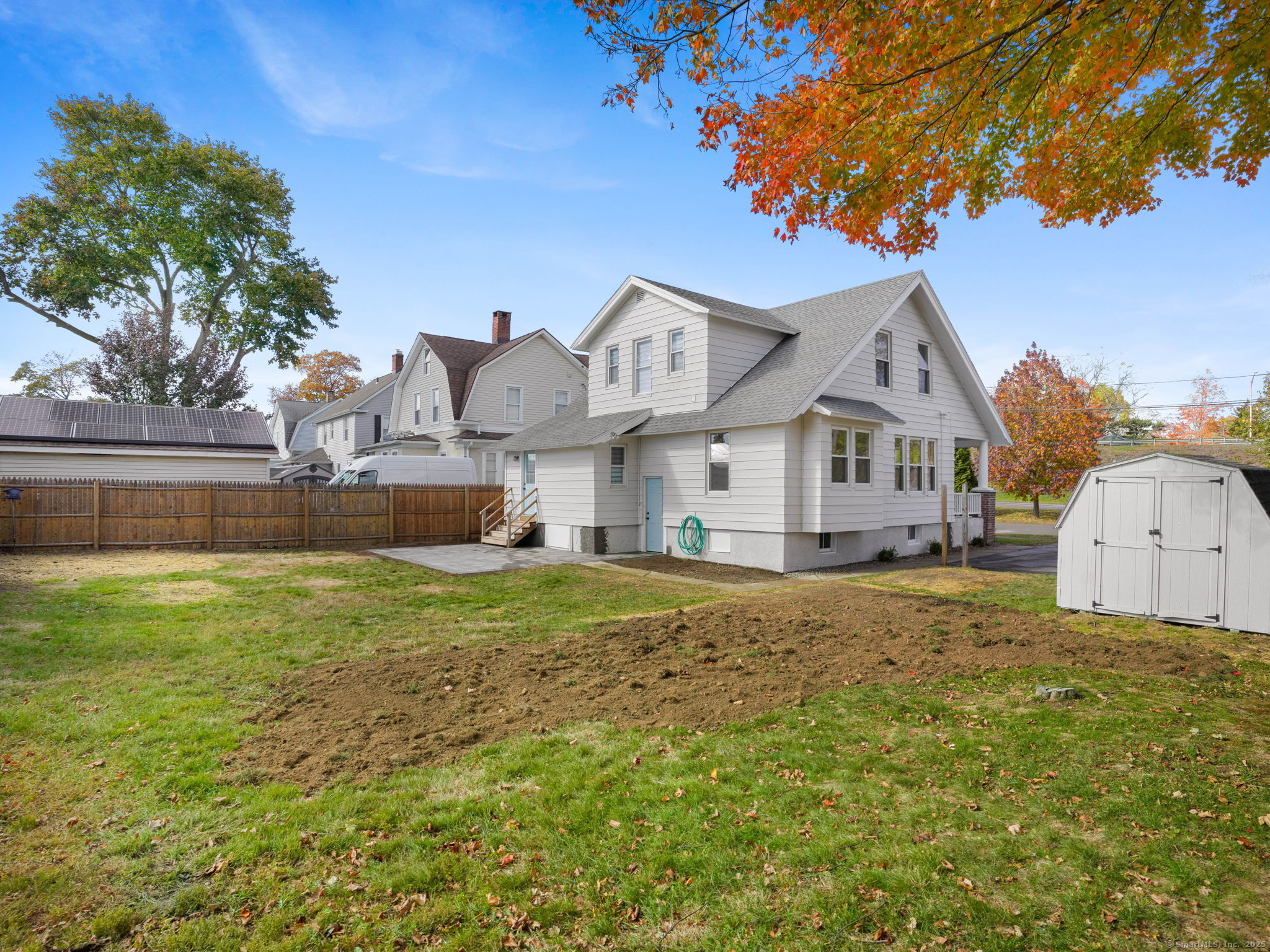29 Redfield Road Fairfield, CT 06824 - Photo 34 of 37 a front view of a house with a yard