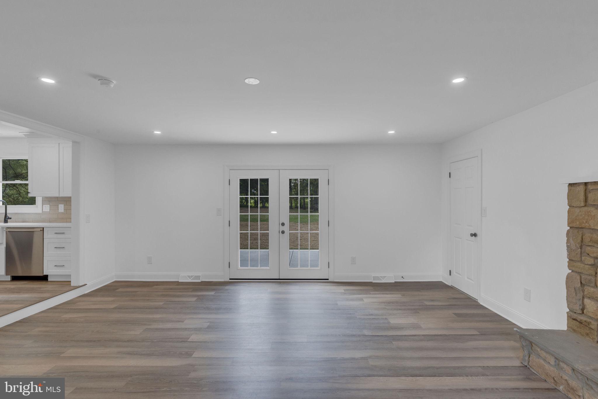 5925 Corrigan Road Doylestown, PA 18902 - Photo 15 of 64 a view of empty room with wooden floor and window