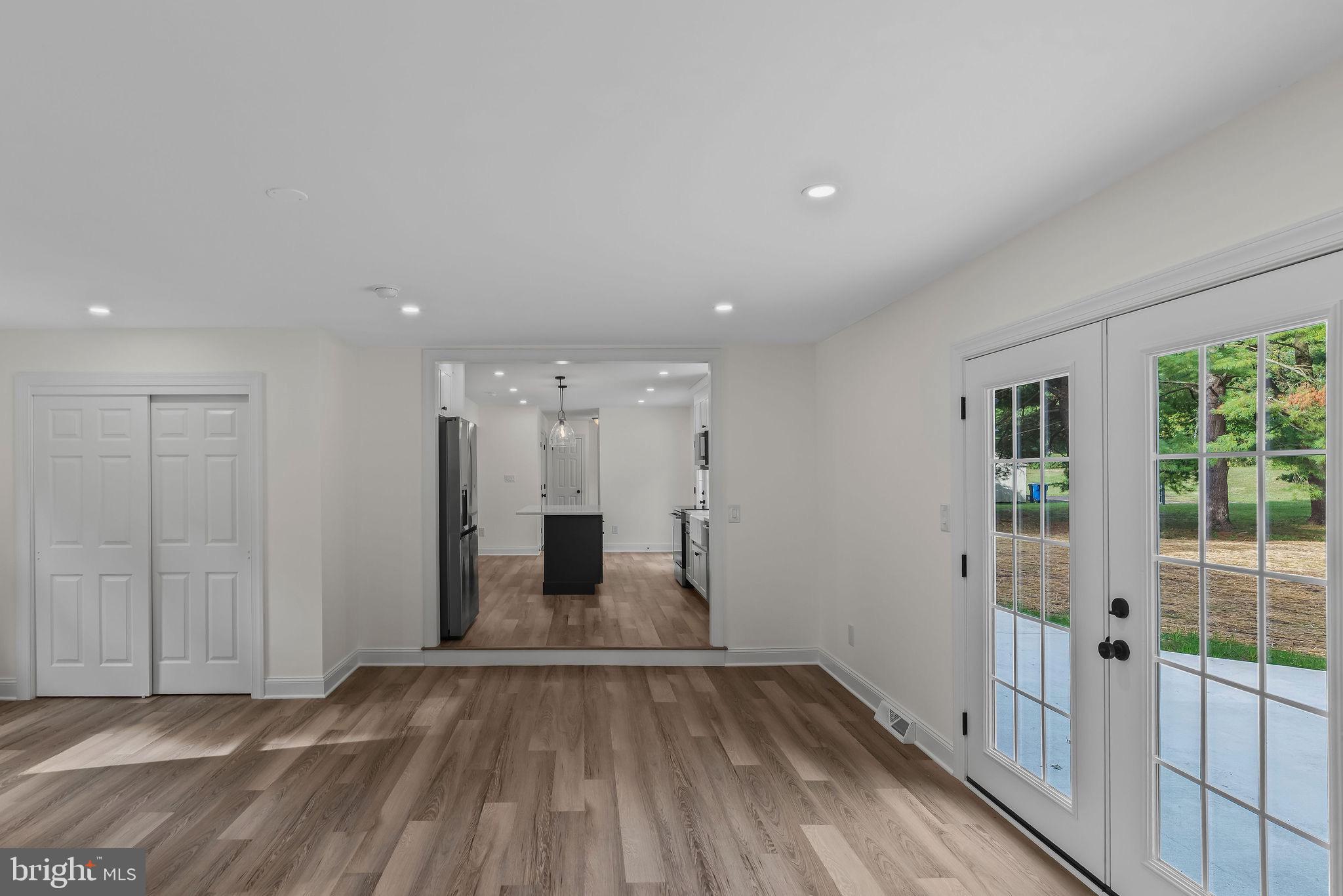 5925 Corrigan Road Doylestown, PA 18902 - Photo 18 of 64 a view of empty room with wooden floor and fan