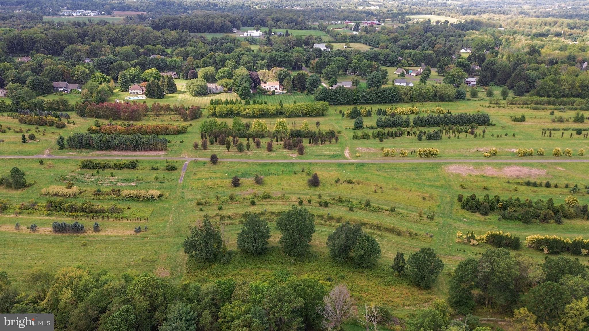 5925 Corrigan Road Doylestown, PA 18902 - Photo 51 of 64 a view of a garden with a houses