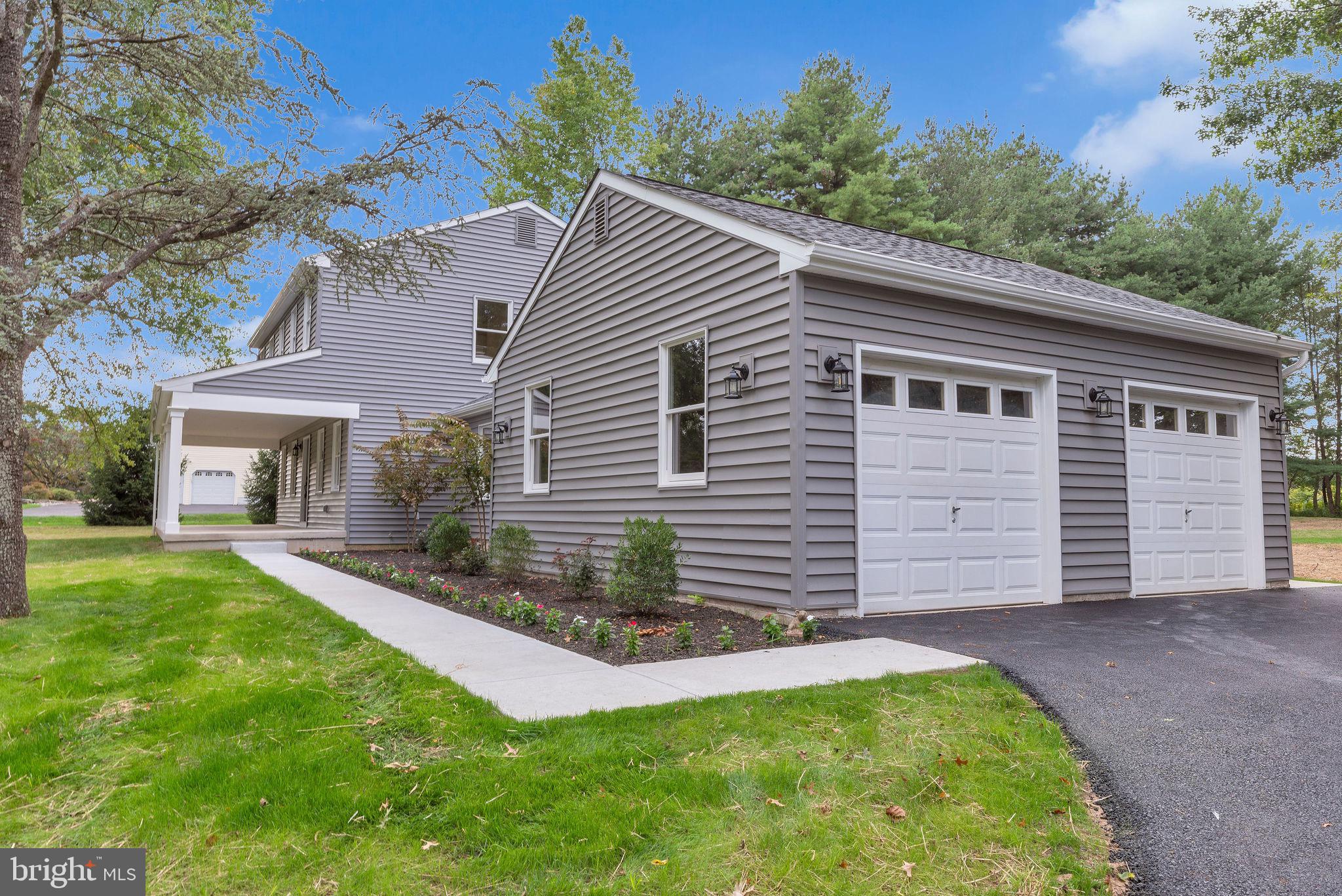 5925 Corrigan Road Doylestown, PA 18902 - Photo 57 of 64 a front view of a house with a yard