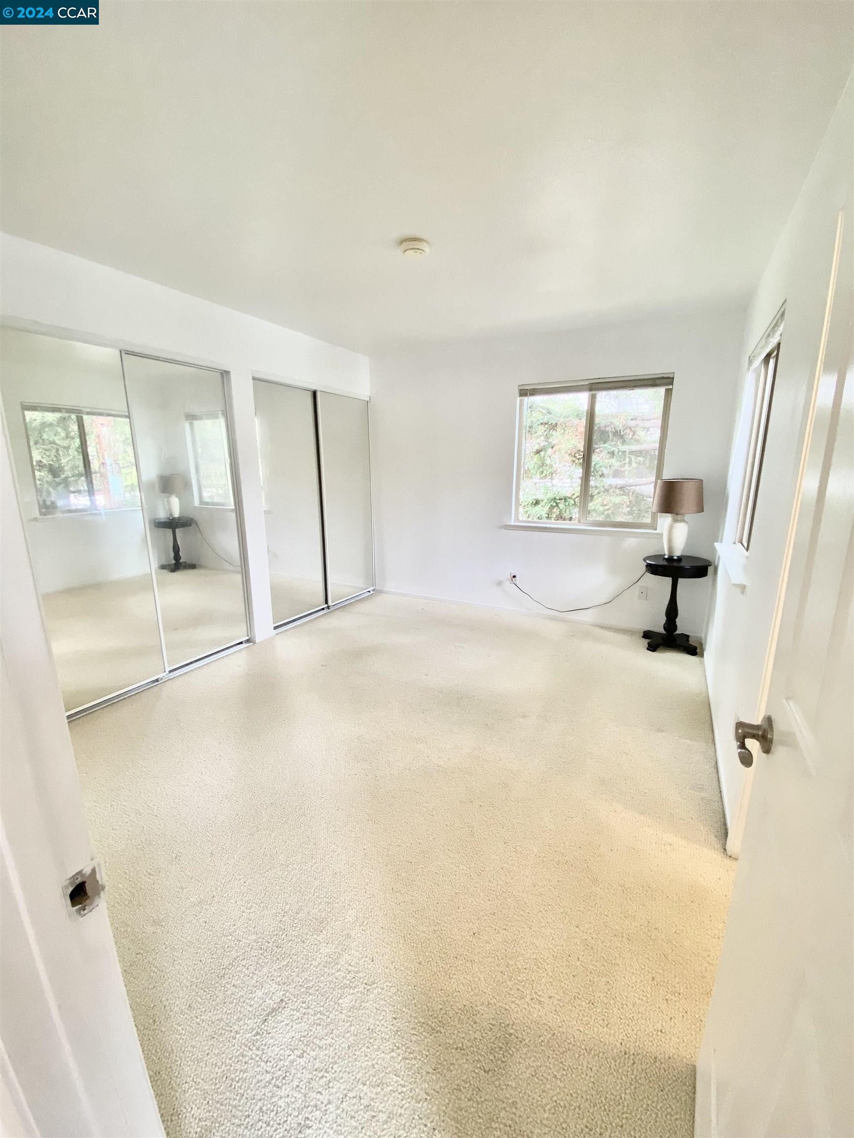 222 Piedmont Lane Pittsburg, CA 94565 - Photo 15 of 25 a large white bed in a white room