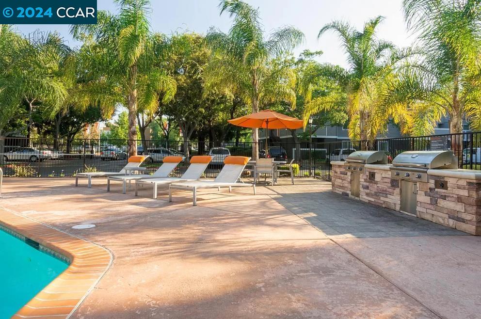 222 Piedmont Lane Pittsburg, CA 94565 - Photo 22 of 25 a view of a street with chairs and tables