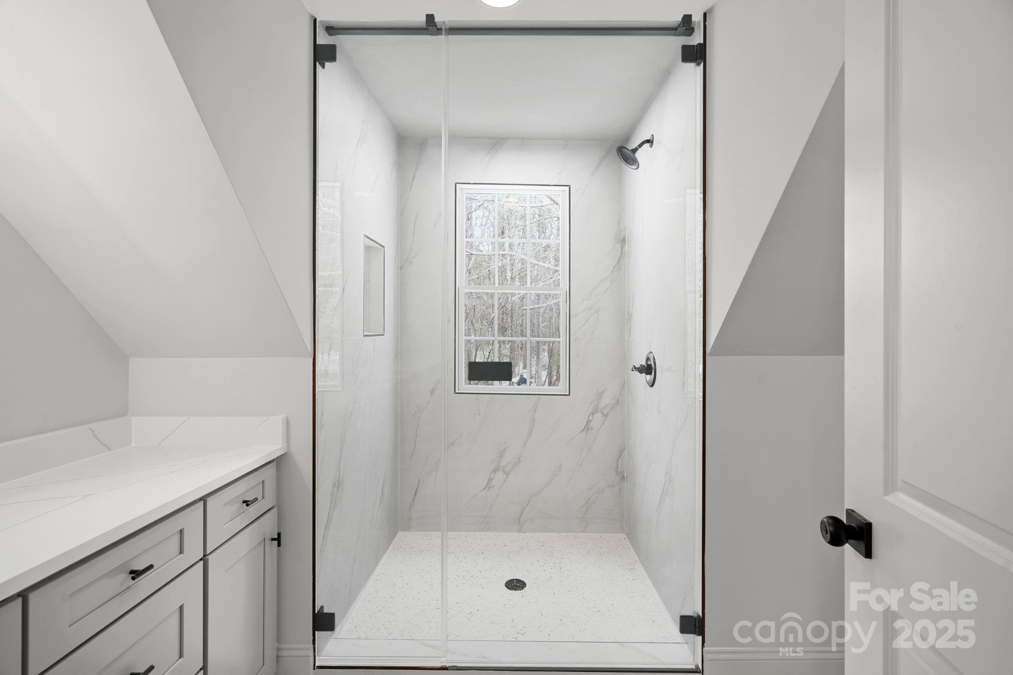 357 Magnolia Street Davidson, NC 28036 - Photo 37 of 48 a bathroom with a shower