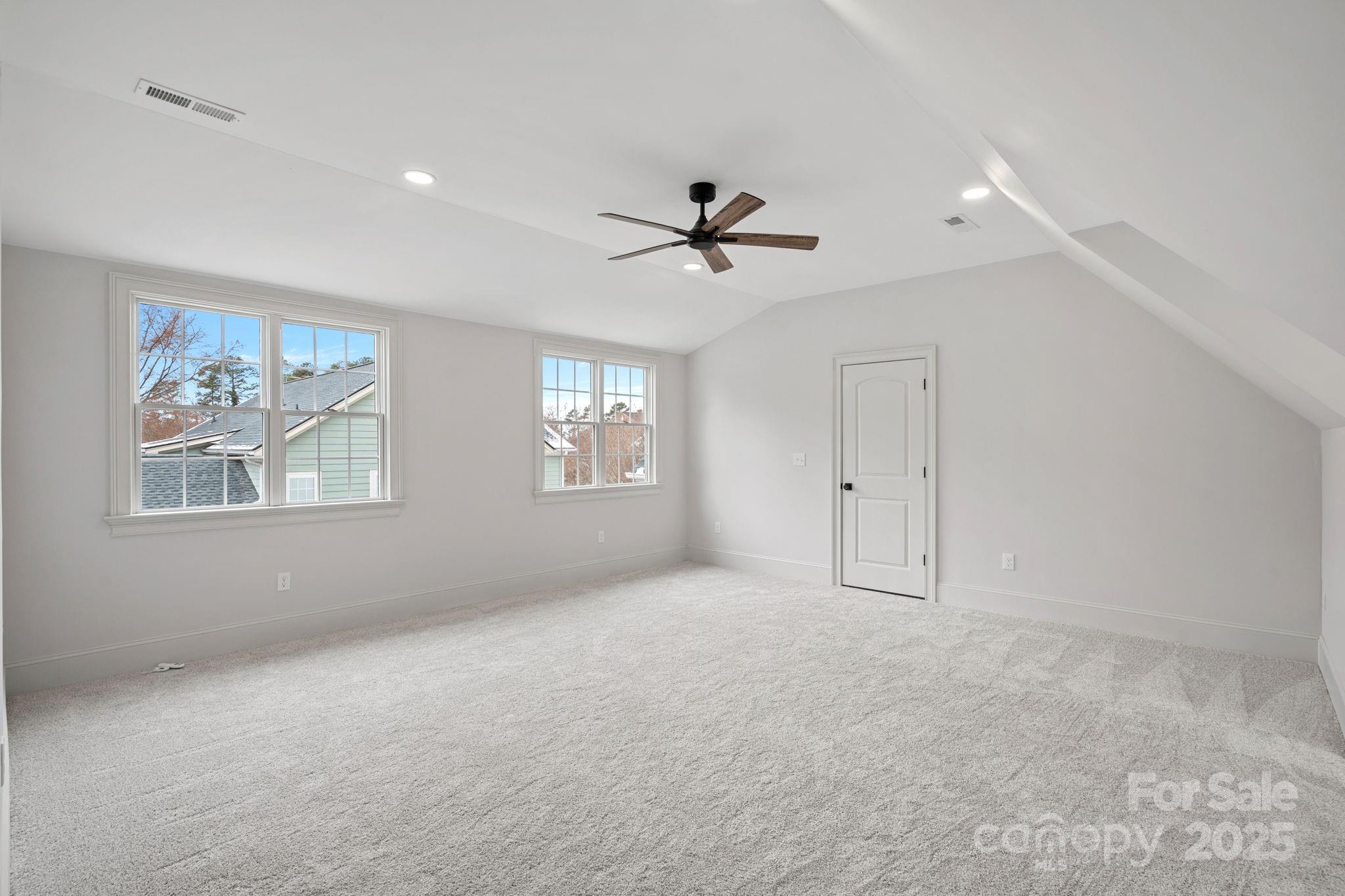 357 Magnolia Street Davidson, NC 28036 - Photo 42 of 48 a view of an empty room with a window