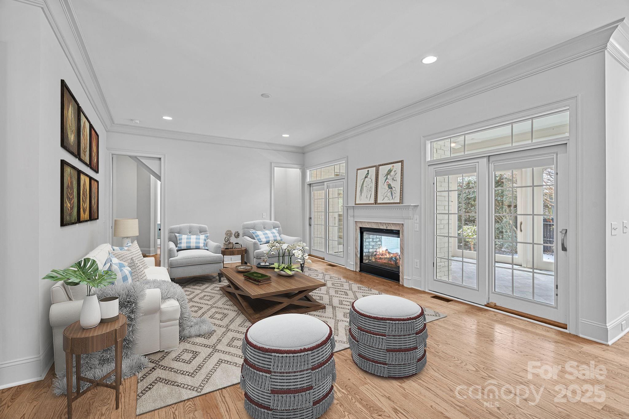 357 Magnolia Street Davidson, NC 28036 - Photo 7 of 48 a living room with furniture a window and a fireplace