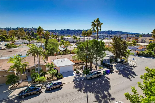 a car parked in front of a house