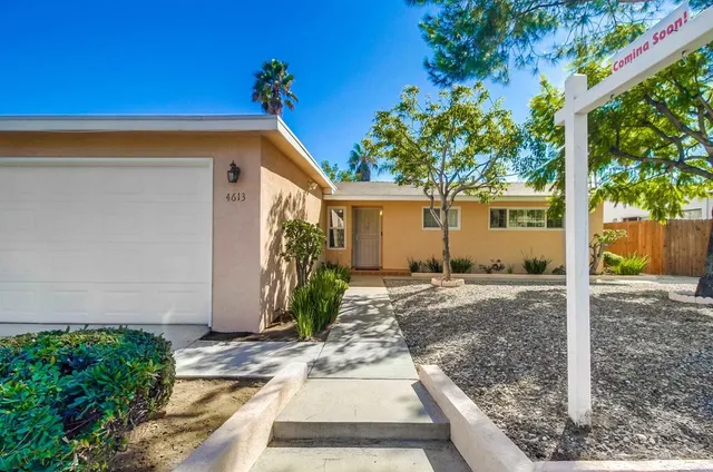a house view with a outdoor space