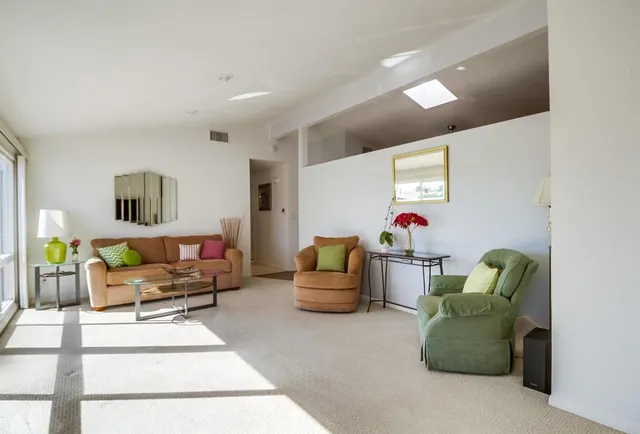 a living room with furniture and a couch