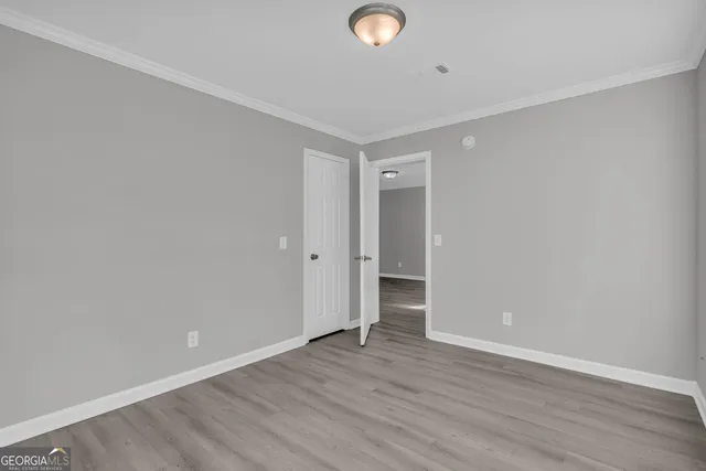 a bathroom with a sink toilet vanity and shower