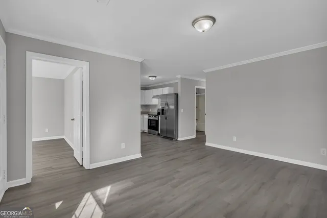 a view of entryway with wooden floor