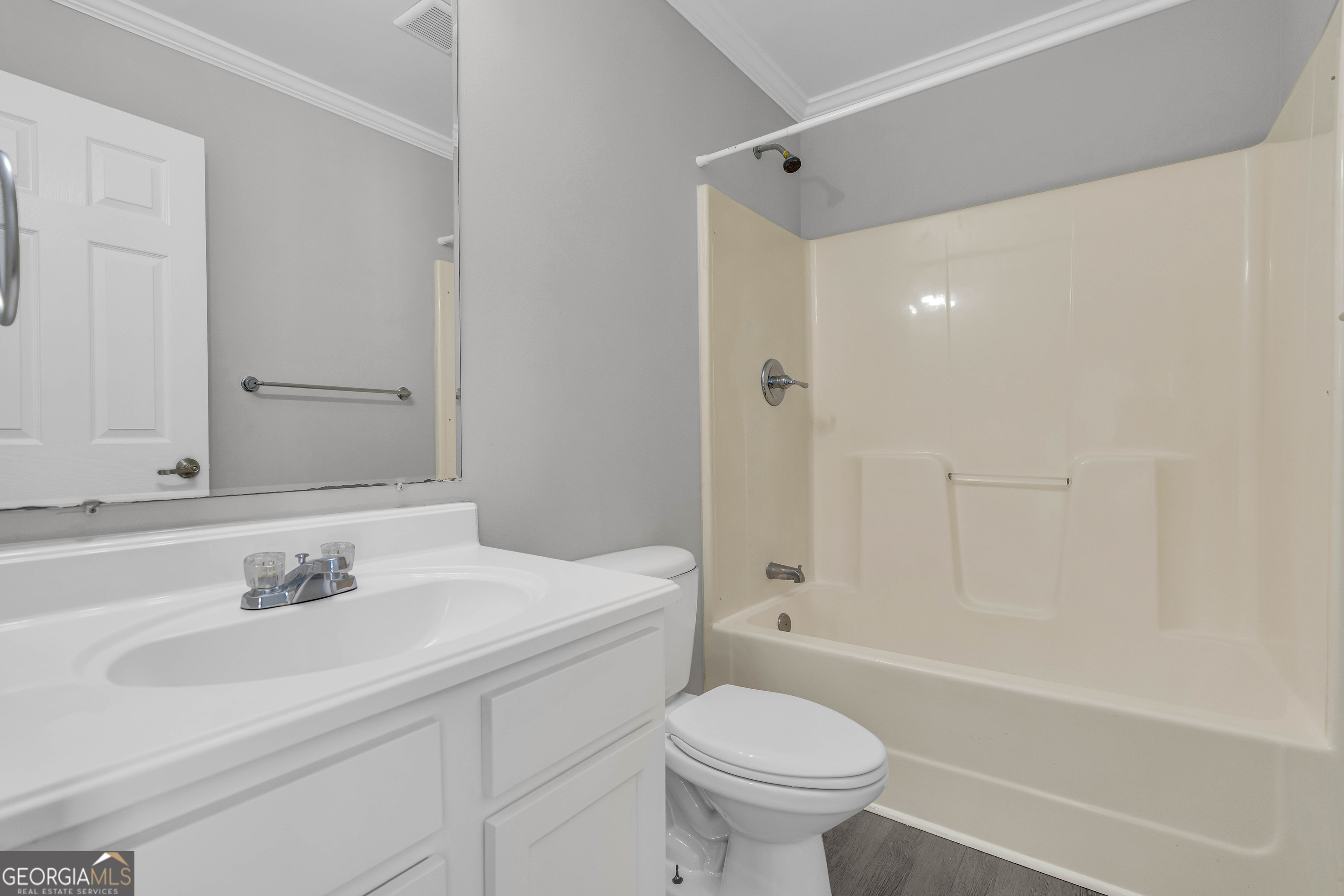 1040 Thomasville Estates Drive Southeast Atlanta, GA 30315 - Photo 24 of 57 a bathroom with a sink toilet and shower