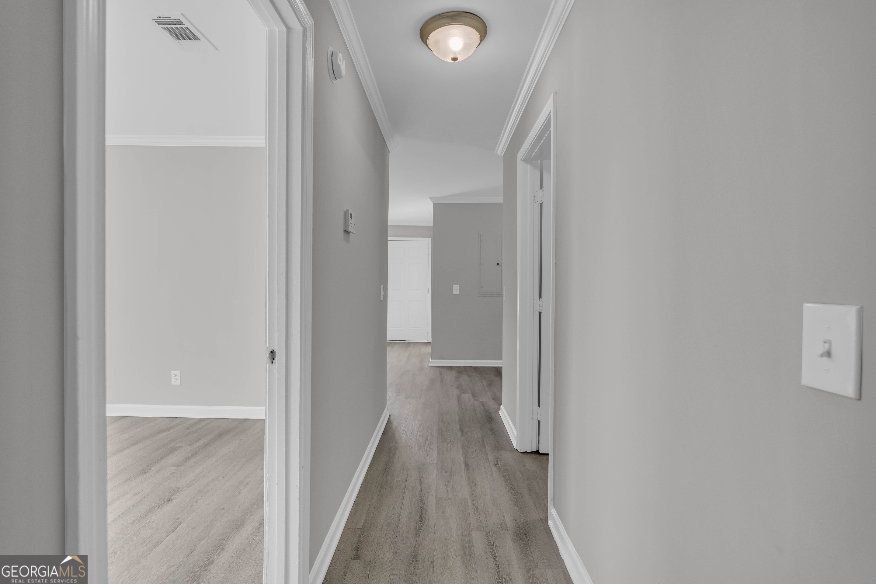 1040 Thomasville Estates Drive Southeast Atlanta, GA 30315 - Photo 25 of 57 a view of a hallway with wooden floor