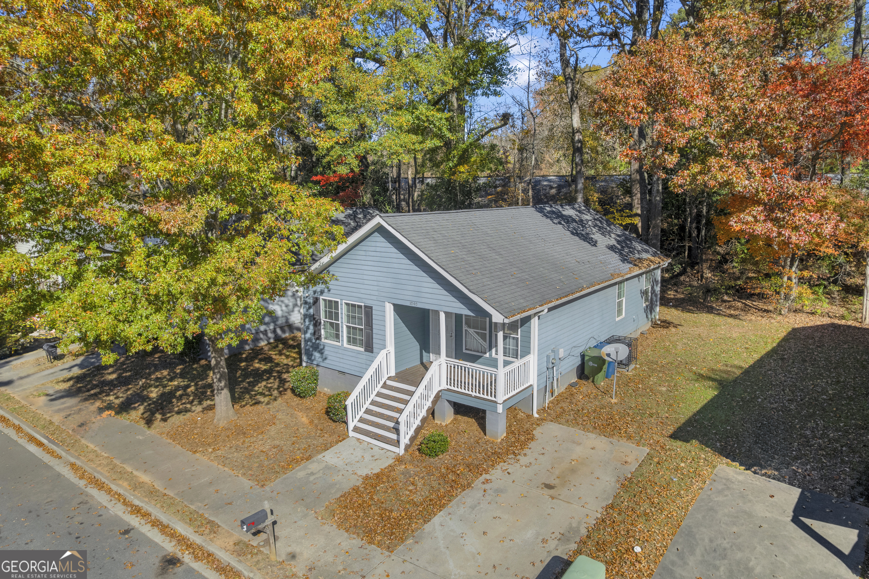 1040 Thomasville Estates Drive Southeast Atlanta, GA 30315 - Photo 3 of 57 a house with trees in the background