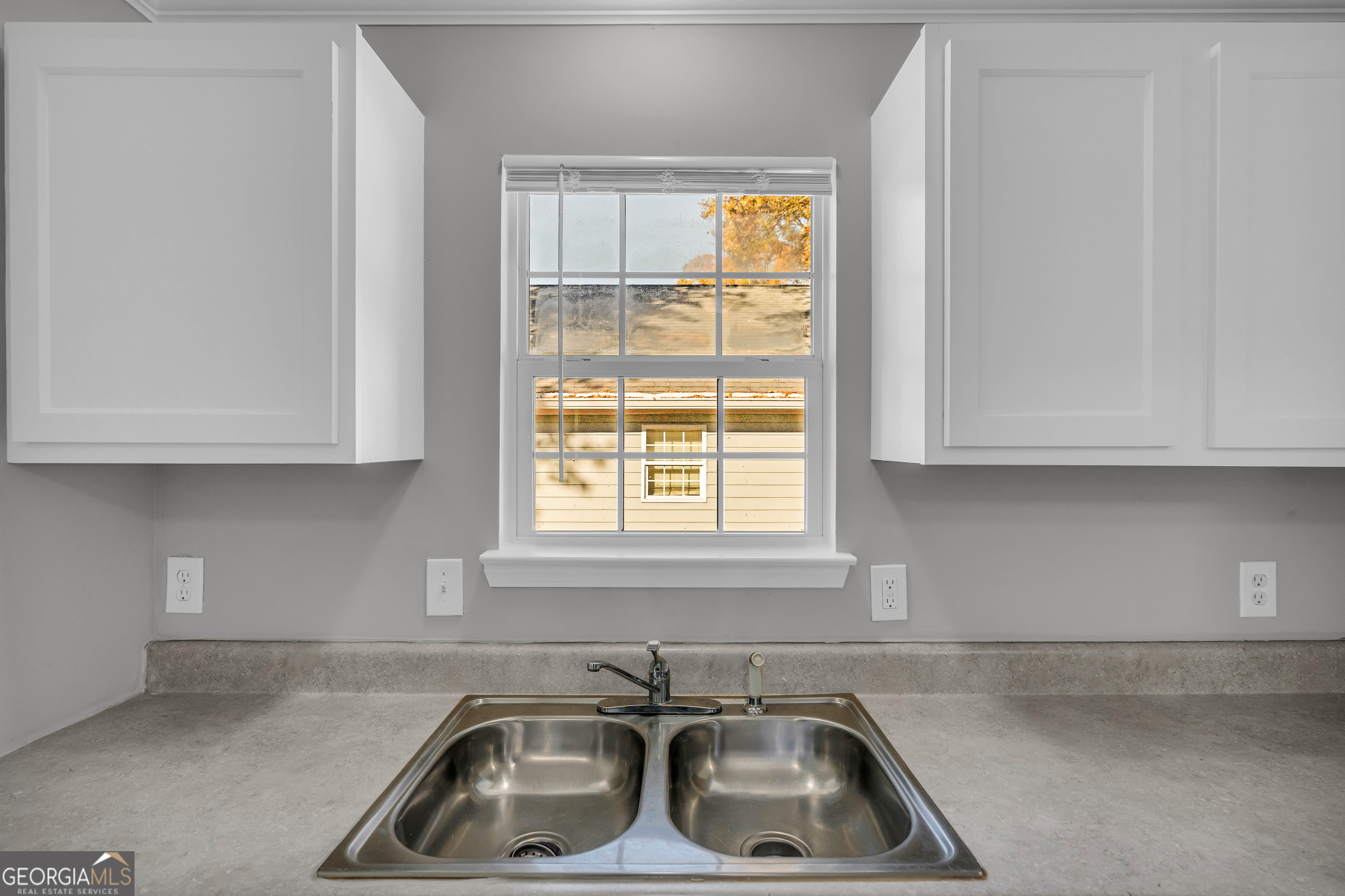 1040 Thomasville Estates Drive Southeast Atlanta, GA 30315 - Photo 36 of 57 a kitchen with sink and window