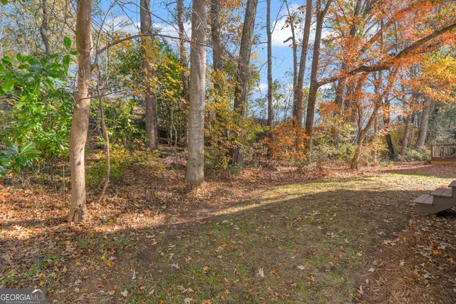 a house with trees in front of it
