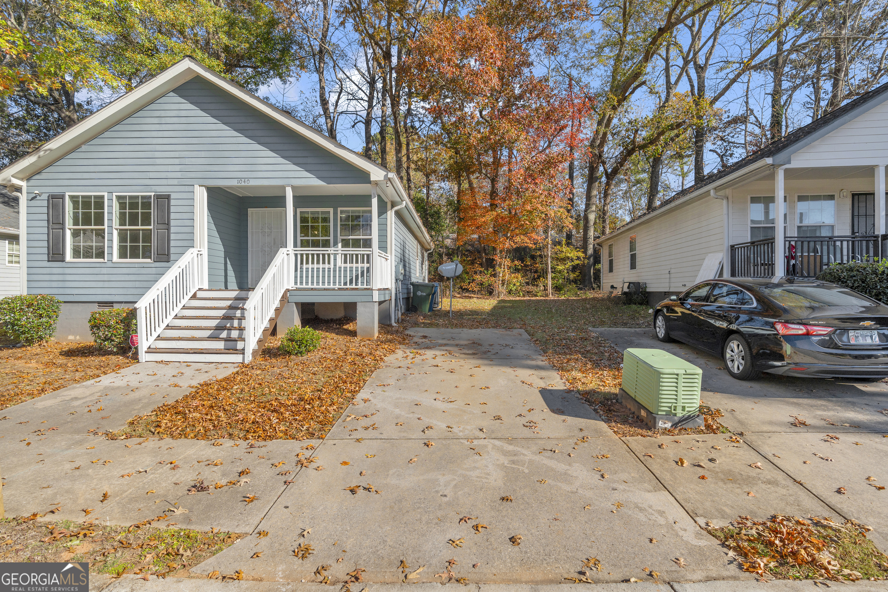 1040 Thomasville Estates Drive Southeast Atlanta, GA 30315 - Photo 45 of 57 a front view of a house with a yard