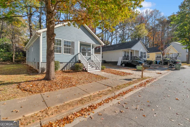 a picture of a bathroom with a sink and mirror