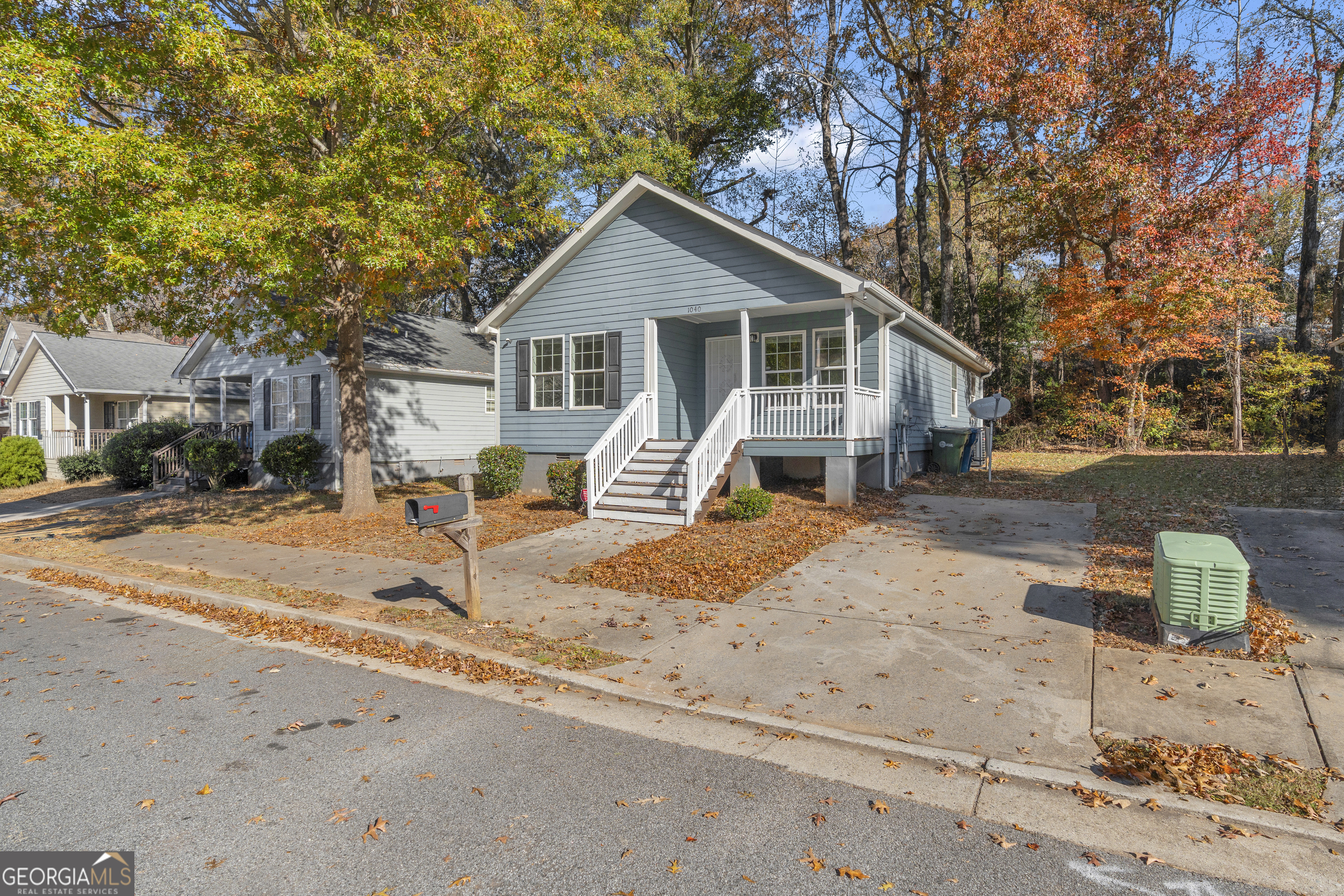 1040 Thomasville Estates Drive Southeast Atlanta, GA 30315 - Photo 50 of 57 a view of a house with snow on the road