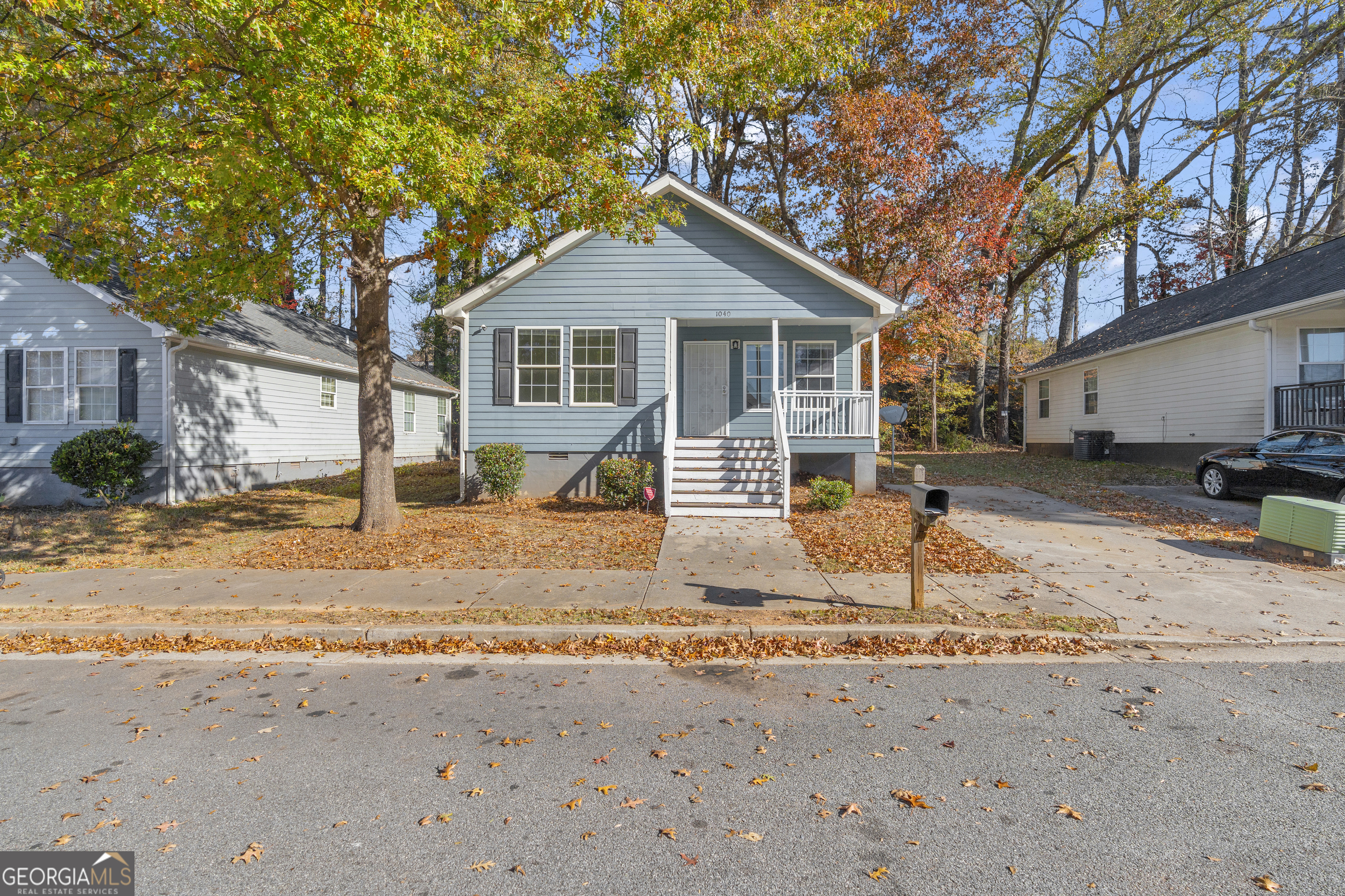 1040 Thomasville Estates Drive Southeast Atlanta, GA 30315 - Photo 51 of 57 a front view of a house with a yard