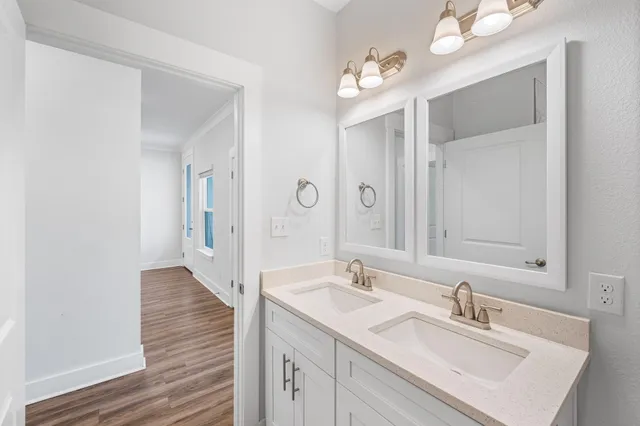a bathroom with a bathtub and shower