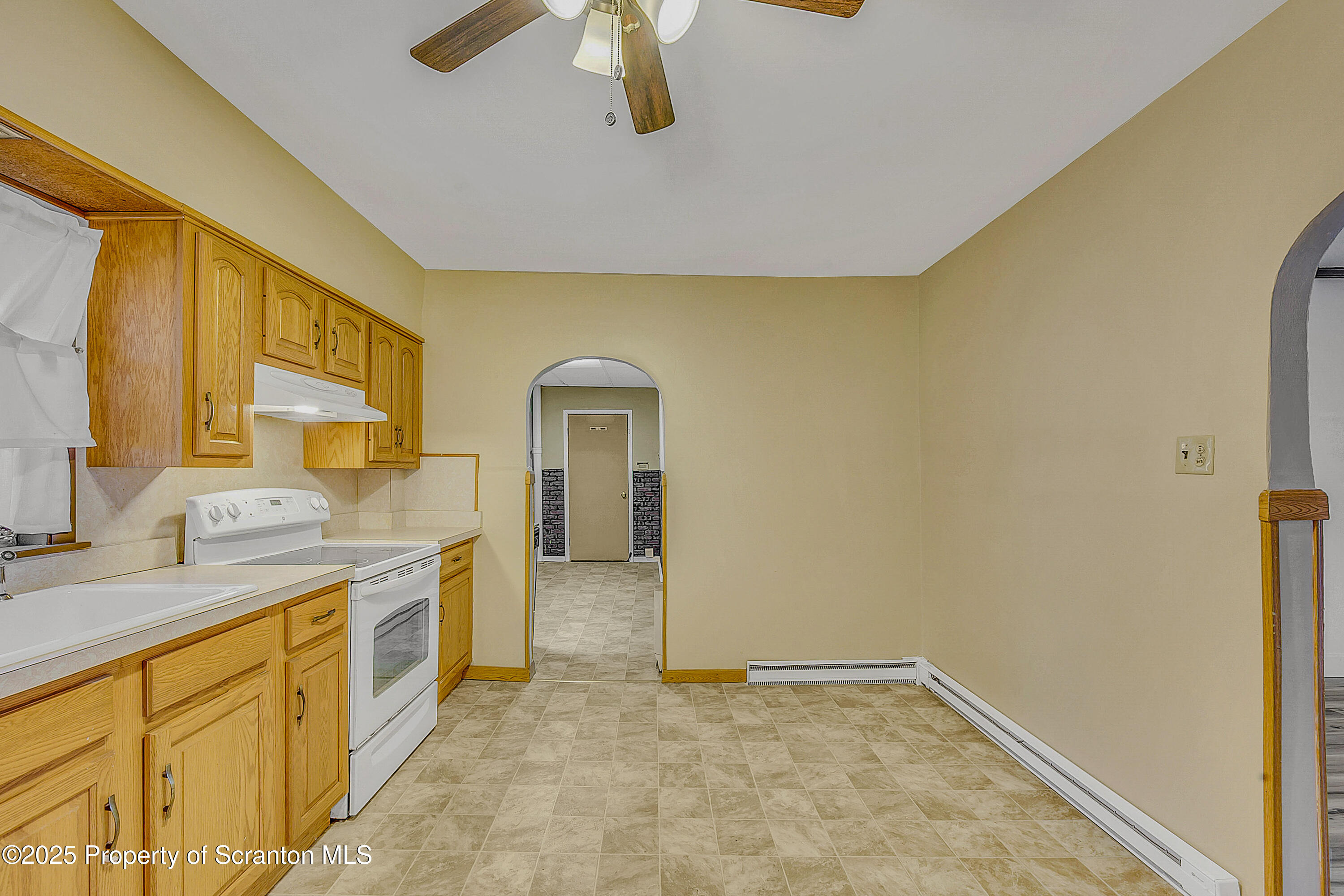 2819 Birney Avenue Scranton, PA 18505 - Photo 11 of 20 a bathroom with a granite countertop sink and a mirror