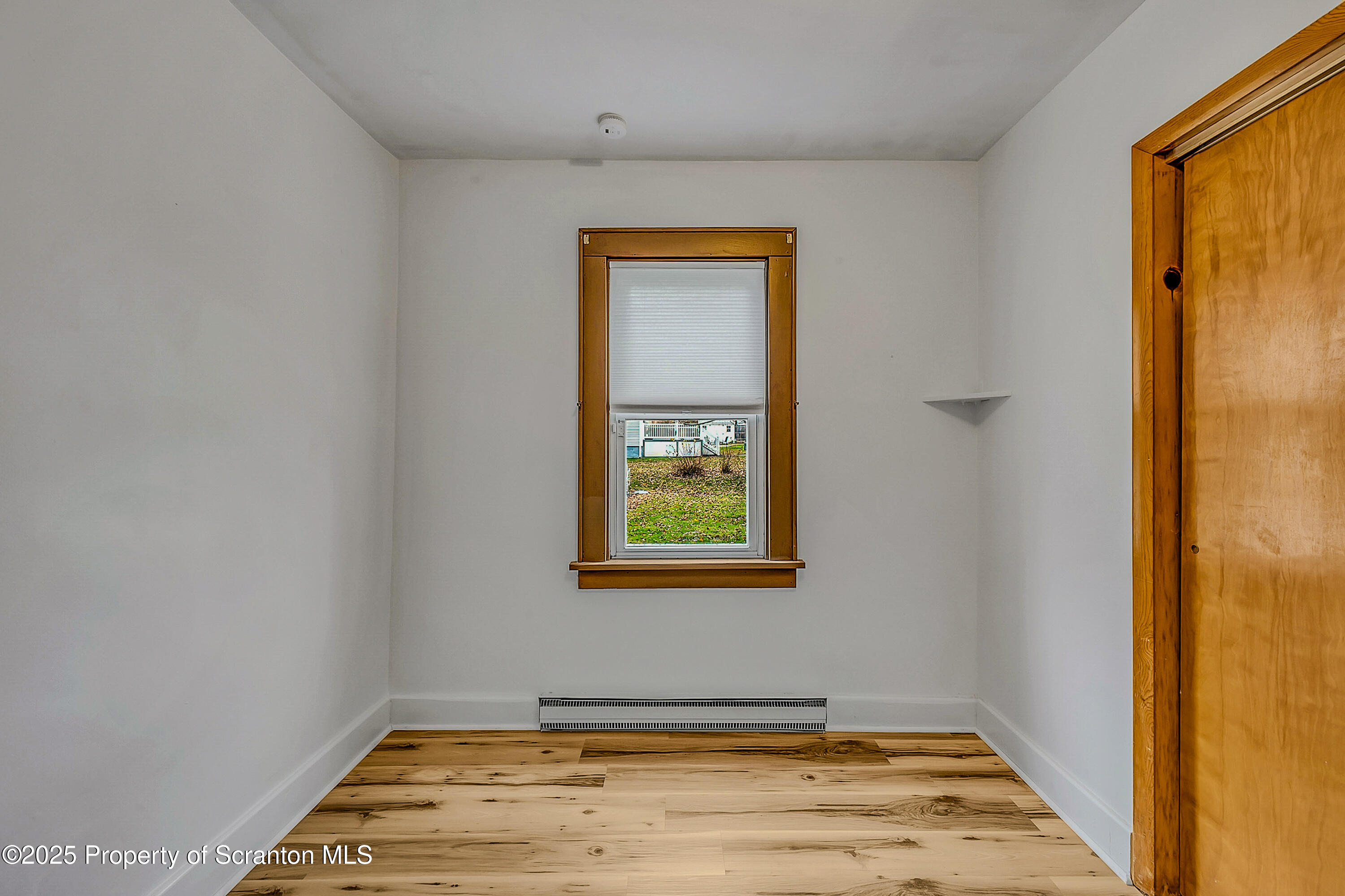 2819 Birney Avenue Scranton, PA 18505 - Photo 15 of 20 a view of a room with wooden floor and windows
