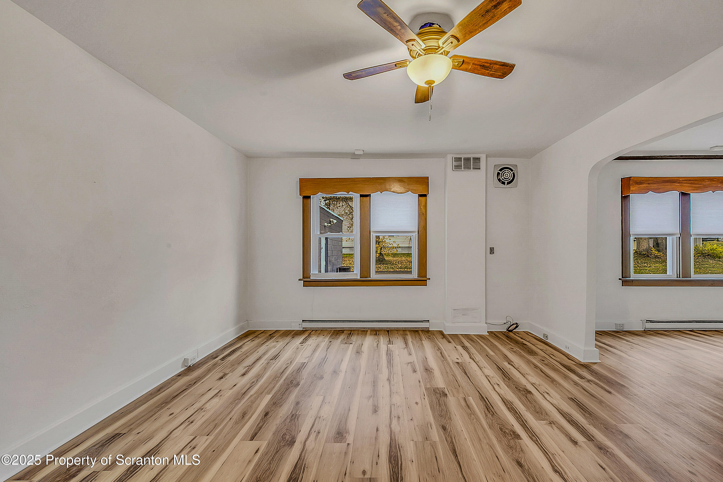 2819 Birney Avenue Scranton, PA 18505 - Photo 6 of 20 wooden floor in an empty room with a window