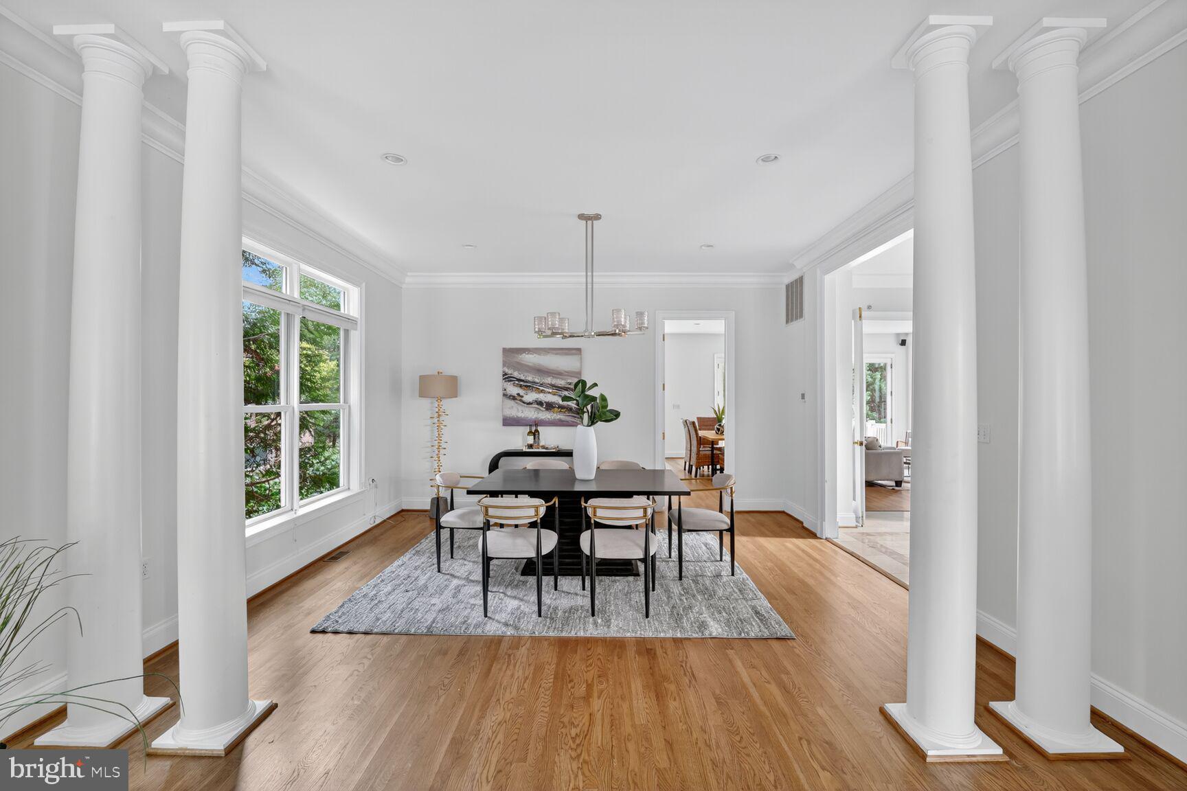 1829 47th Place Northwest Washington, DC 20007 - Photo 11 of 44 a view of a dining room with furniture window and wooden floor