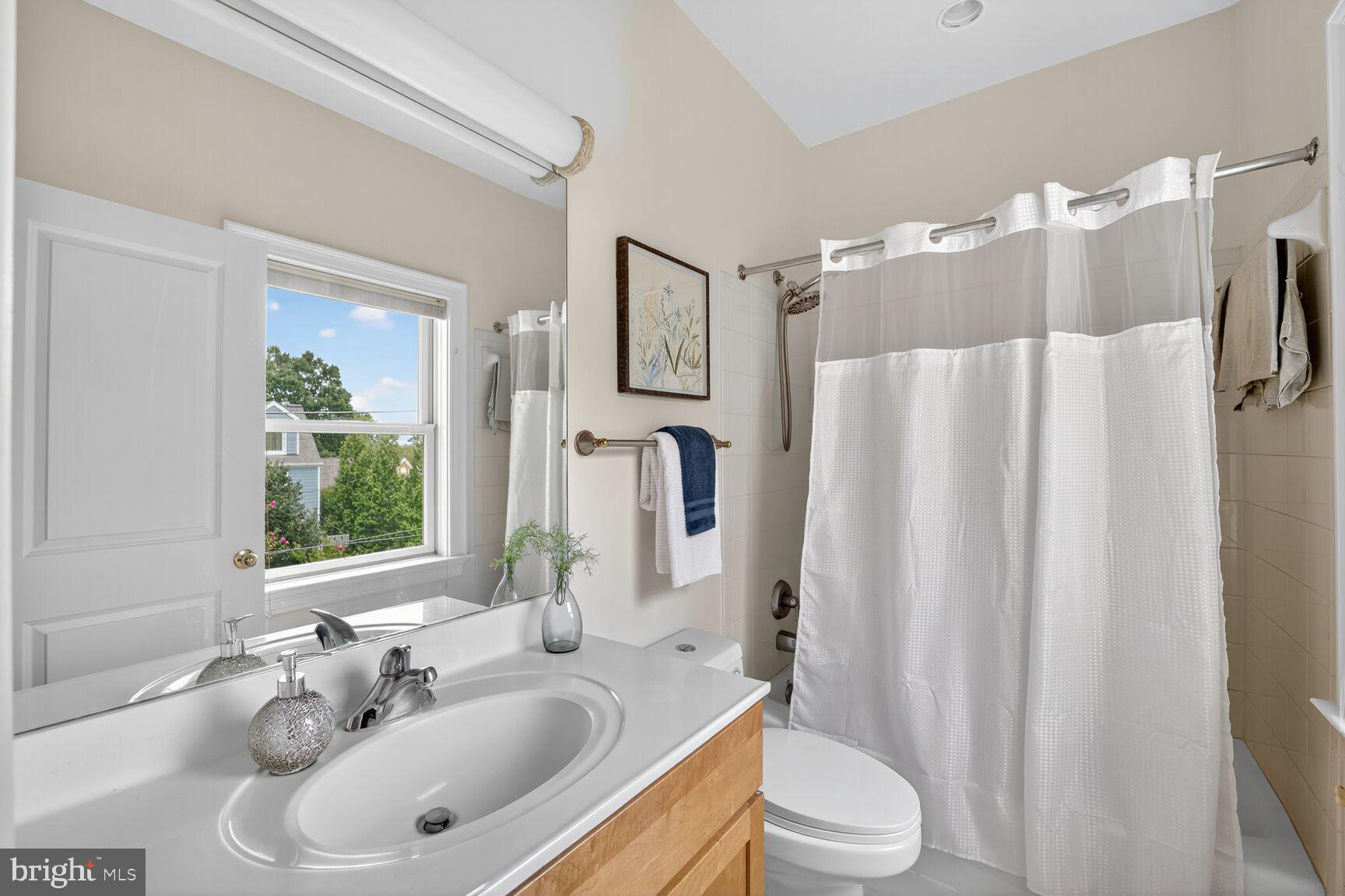 1829 47th Place Northwest Washington, DC 20007 - Photo 31 of 44 a bathroom with a sink toilet and shower