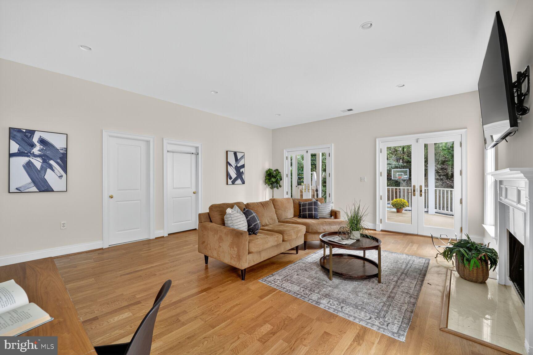 1829 47th Place Northwest Washington, DC 20007 - Photo 33 of 44 a living room with furniture flat screen tv and a large window