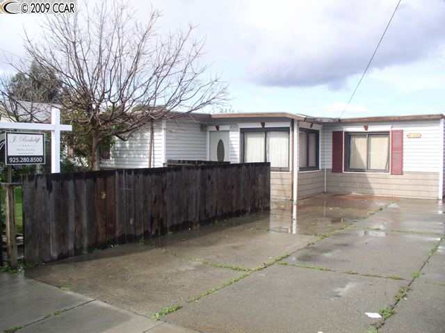 110 Shore Road Bay Point, CA 94565 - Photo 1 of 1 a view of a house with a backyard