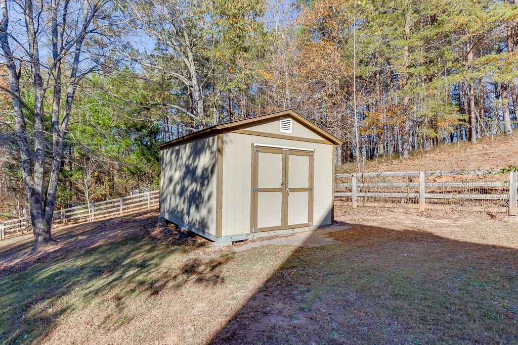 6360 Nix Road Dawsonville, GA 30534 - Photo 12 of 58 a view of a house with a yard