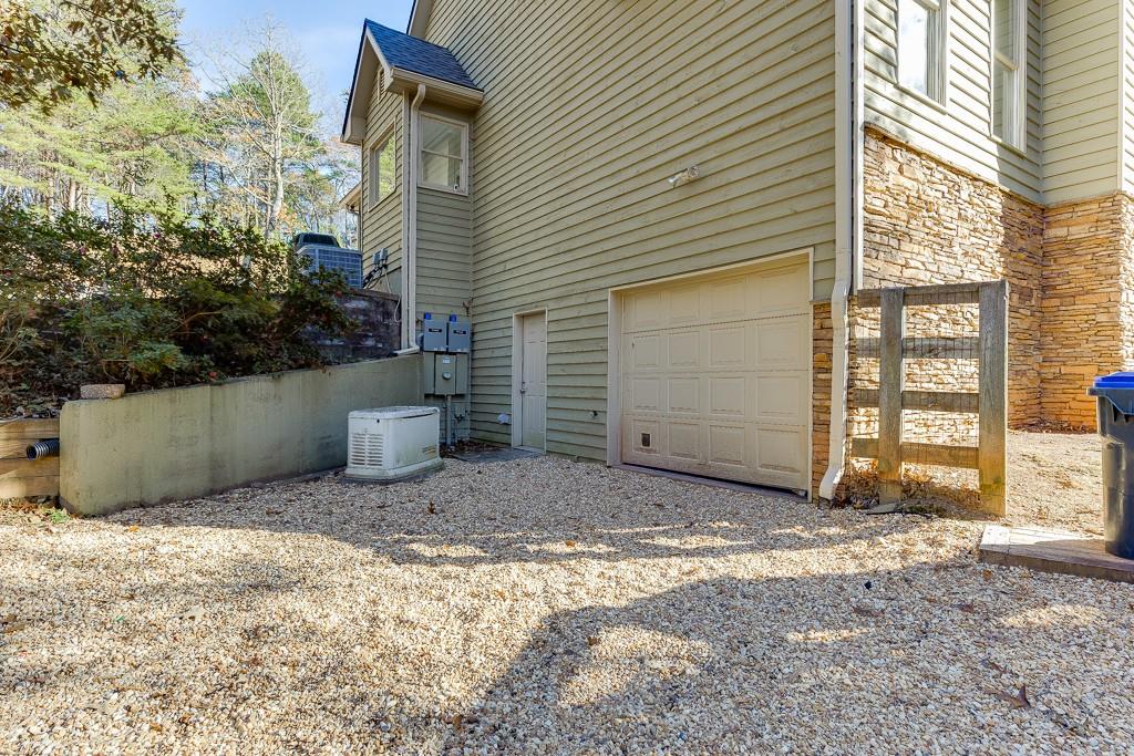 6360 Nix Road Dawsonville, GA 30534 - Photo 15 of 58 a view of a house with backyard and trees